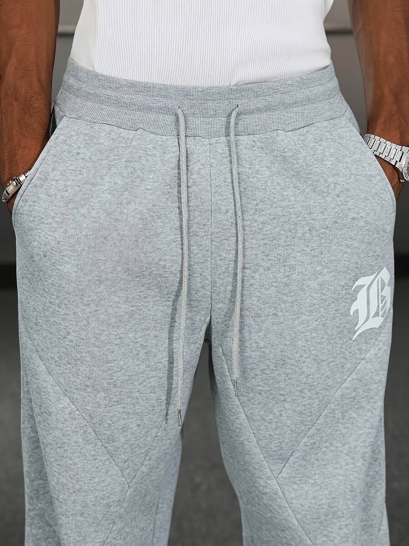 Men's Casual Pants, Stretch Solid Color Trousers, Loose Fit, Printed Pattern with Pockets, Elastic Waistband with Drawstring for Adjustable Fit, Combining Comfort and Style, Suitable for Streetwear and Outdoor Activities