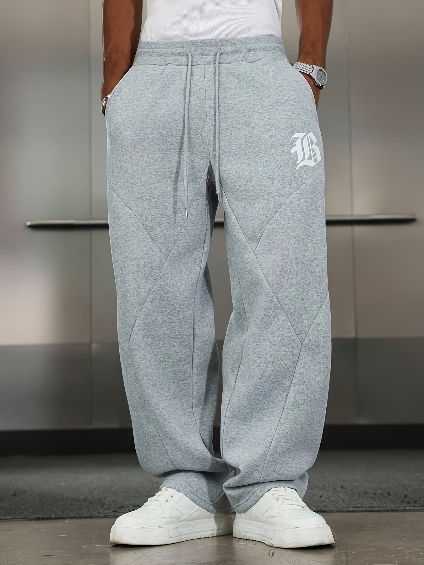 Men's Casual Pants, Stretch Solid Color Trousers, Loose Fit, Printed Pattern with Pockets, Elastic Waistband with Drawstring for Adjustable Fit, Combining Comfort and Style, Suitable for Streetwear and Outdoor Activities